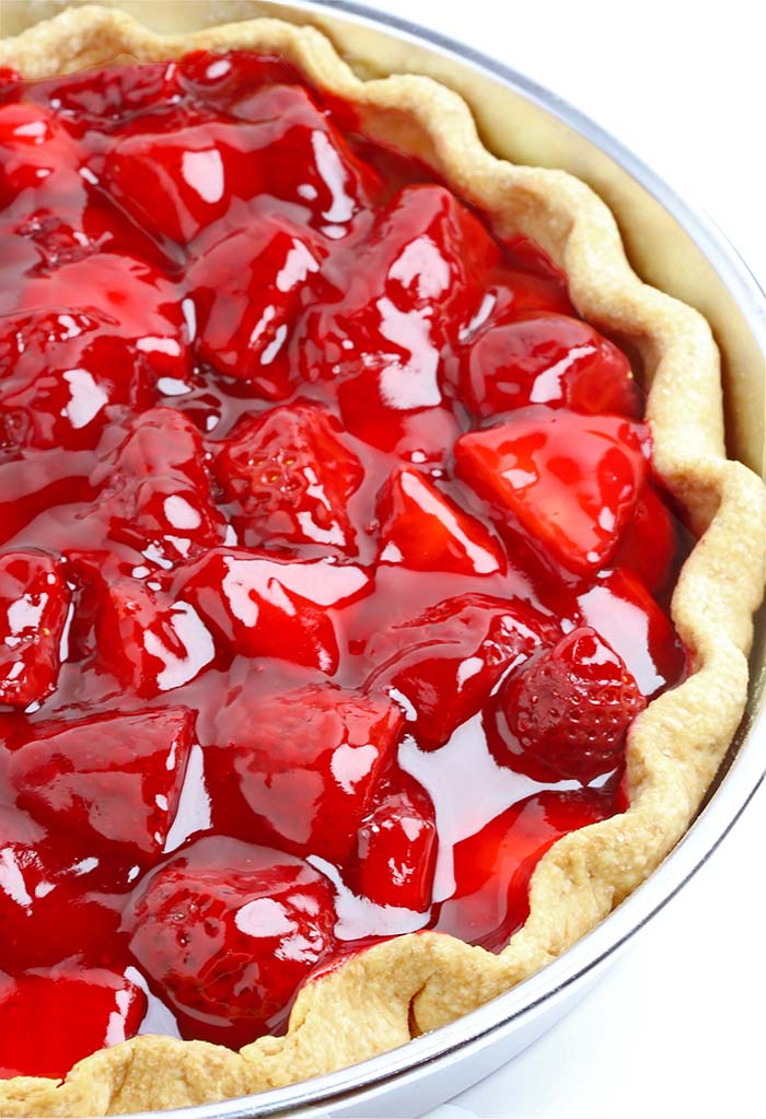 This easy fresh strawberry pie with Homemade All Butter Crust is bursting with fresh strawberries. It’s a perfect spring treat!