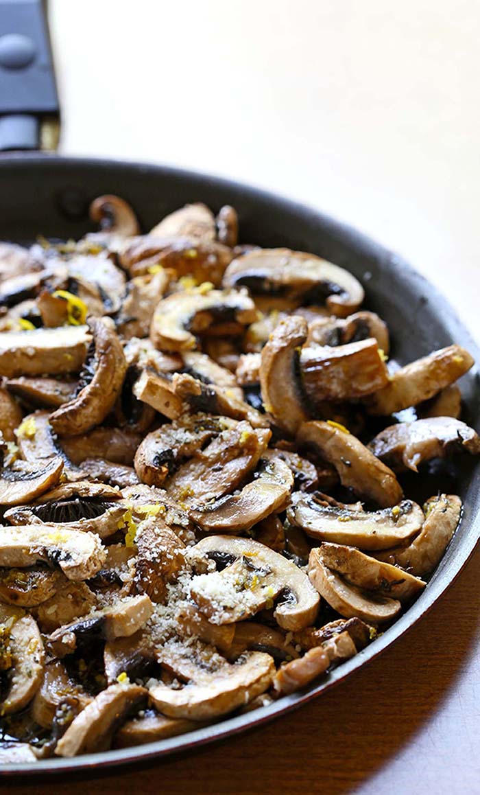 Baked Garlic Parmesan Mushrooms are so simple, no sauteing, no flipping, no watching a skillet, a little lemon zest, garlic and parmesan, and complete and tasty meal for you to enjoy it