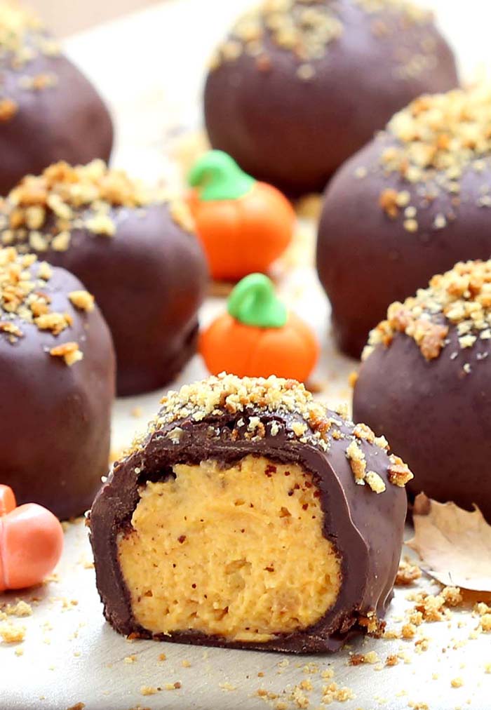 These deliciously addicting melt-in-your-mouth pumpkin pie truffles are made with a spiced pumpkin cheesecake filling that’s smothered in rich, dark chocolate!