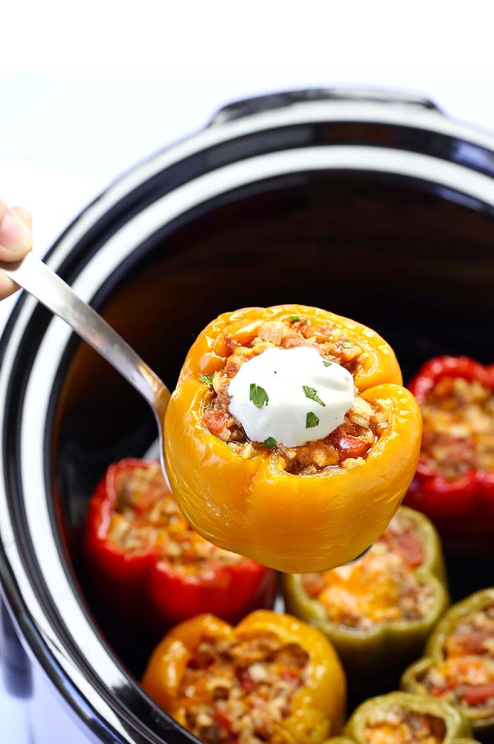 Old fashioned stuffed bell peppers were a staple in our family when I was a kid and they find the way onto my family’s table now. They are an inexpensive comfort food that can be made in the oven, crockpot, or top of stove. There are a lot of variations but here is how I like them. They are wonderful to make and freeze as well.
