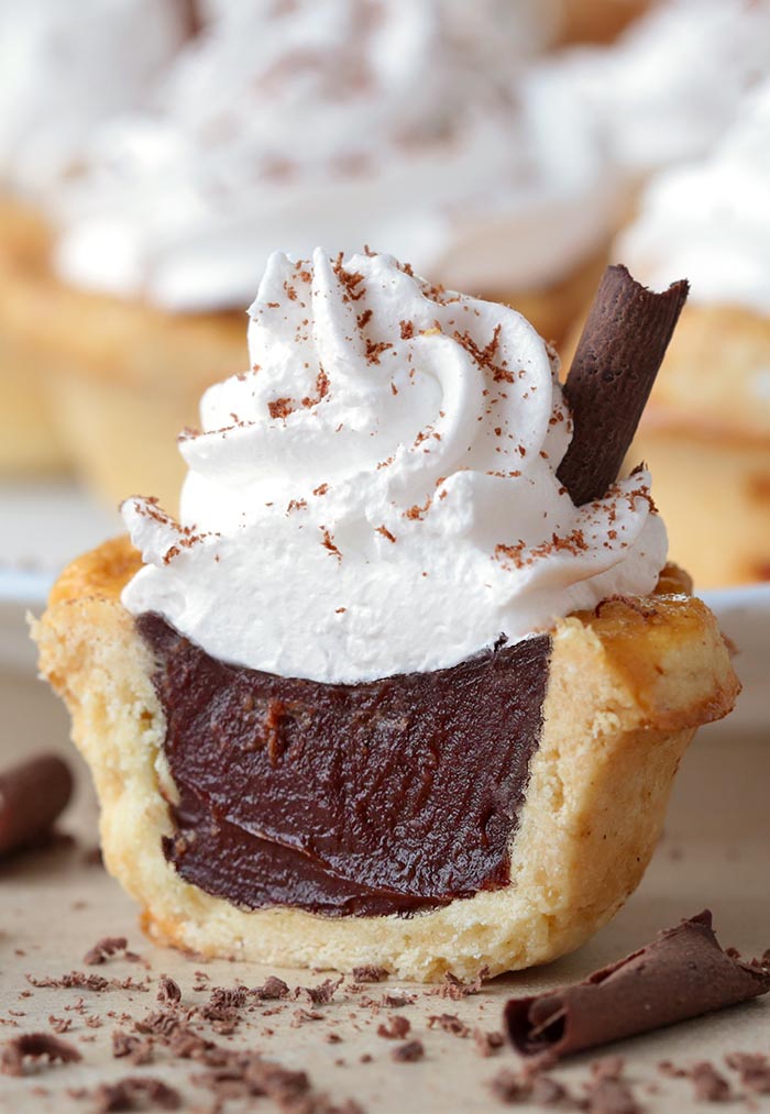 All the flavors of Homemade Chocolate Cream Pie packed into perfect bite-sized treat to share with a loved one on a special occasion – with leftovers, of course! – Chocolate Cream Pie Bites...