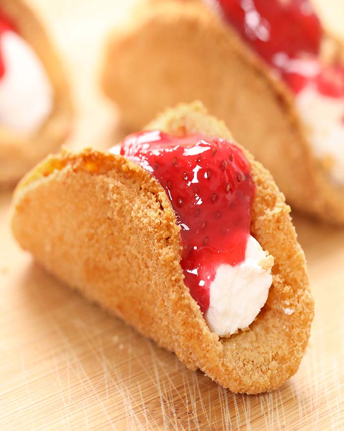 A great dessert idea to make this spring/summer is Strawberry Cheesecake Tacos! They are fun and easy to make and great to serve to a crowd !