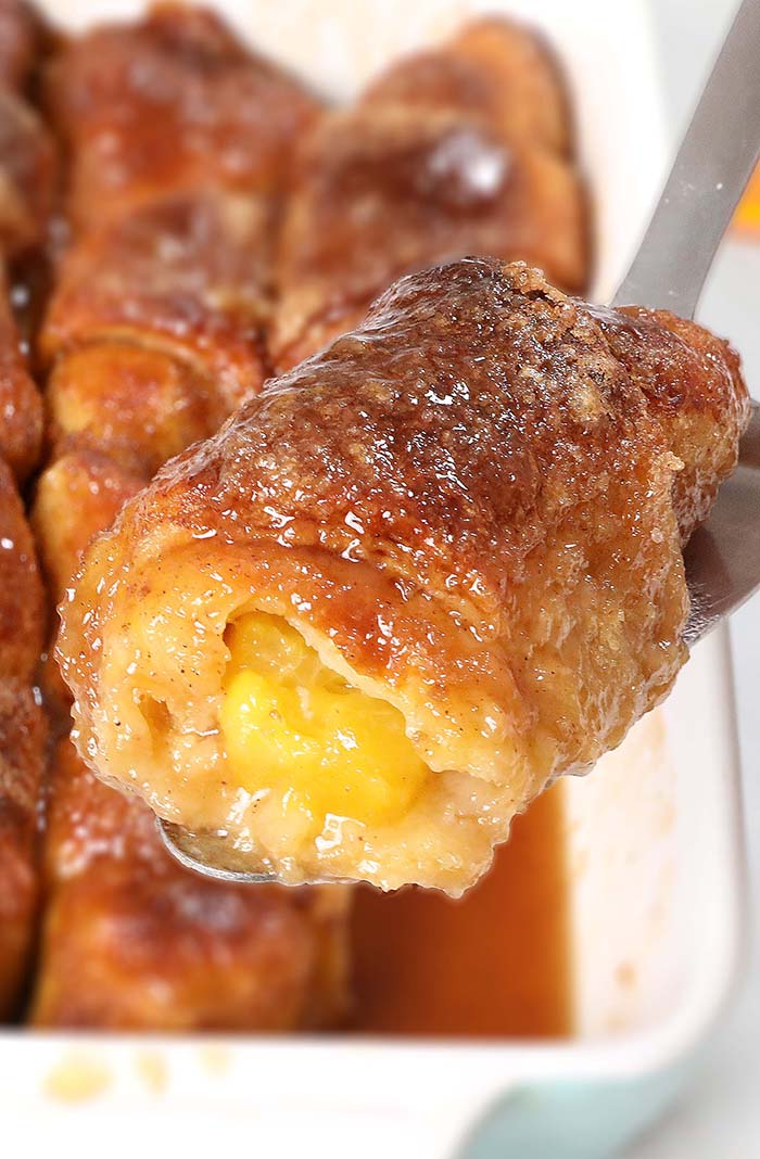 Crescent Roll Peach Dumplings are an easy dessert made with peaches, crescent dough, a brown sugar butter sauce, and soda.