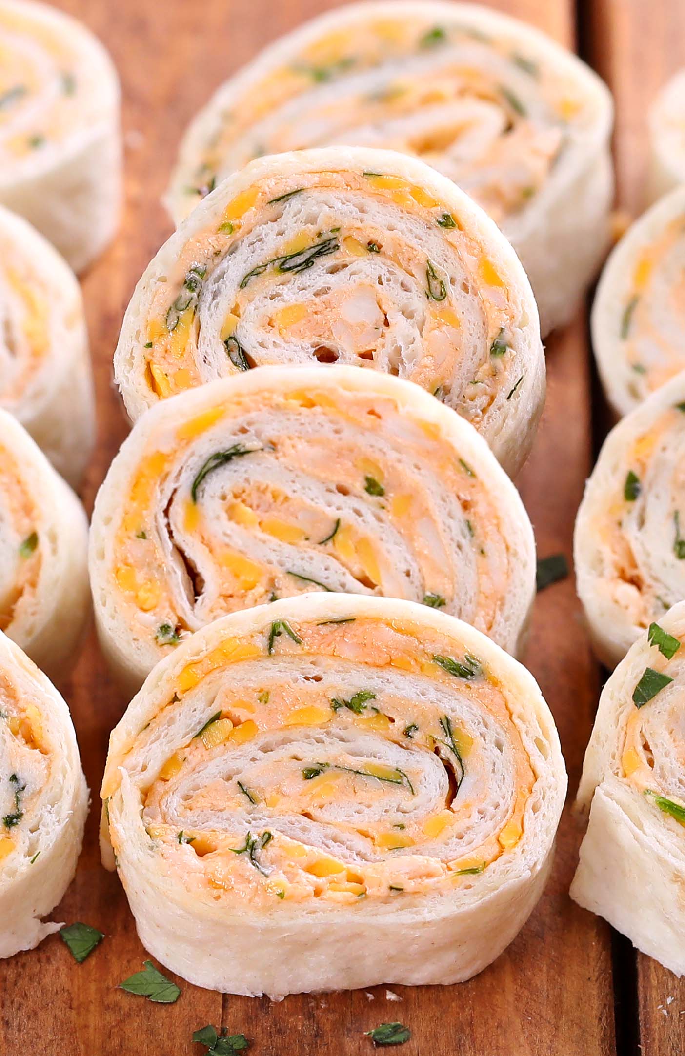 Taco Tortilla Roll Ups - An easy Christmas, New Year´s Eve, Game Day, or after-school snack with tons of great flavor and you make them ahead of time!